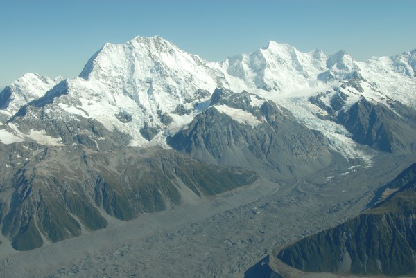 The iconic Tasman Glacier is shrunken and almost completely covered in debris.